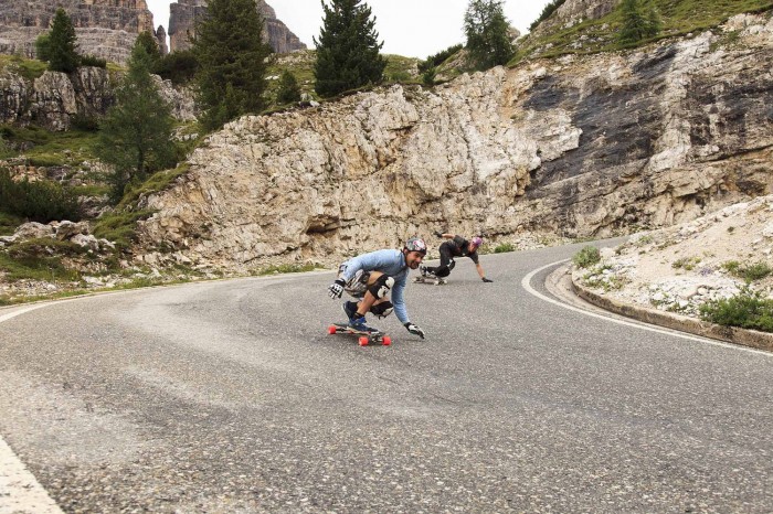 downhill-longboarders-riding-in-the-italian-alps