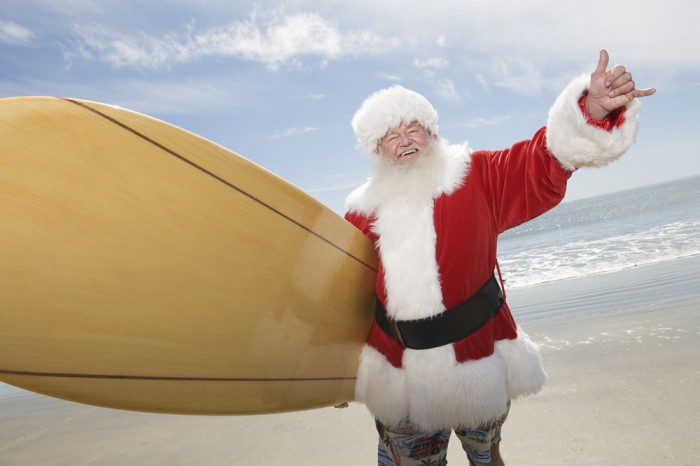 Santa Claus surfer